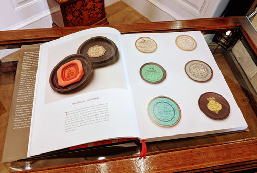 An open page view of Matrix - a collection of British seals showing a selection of seal boxes and labels