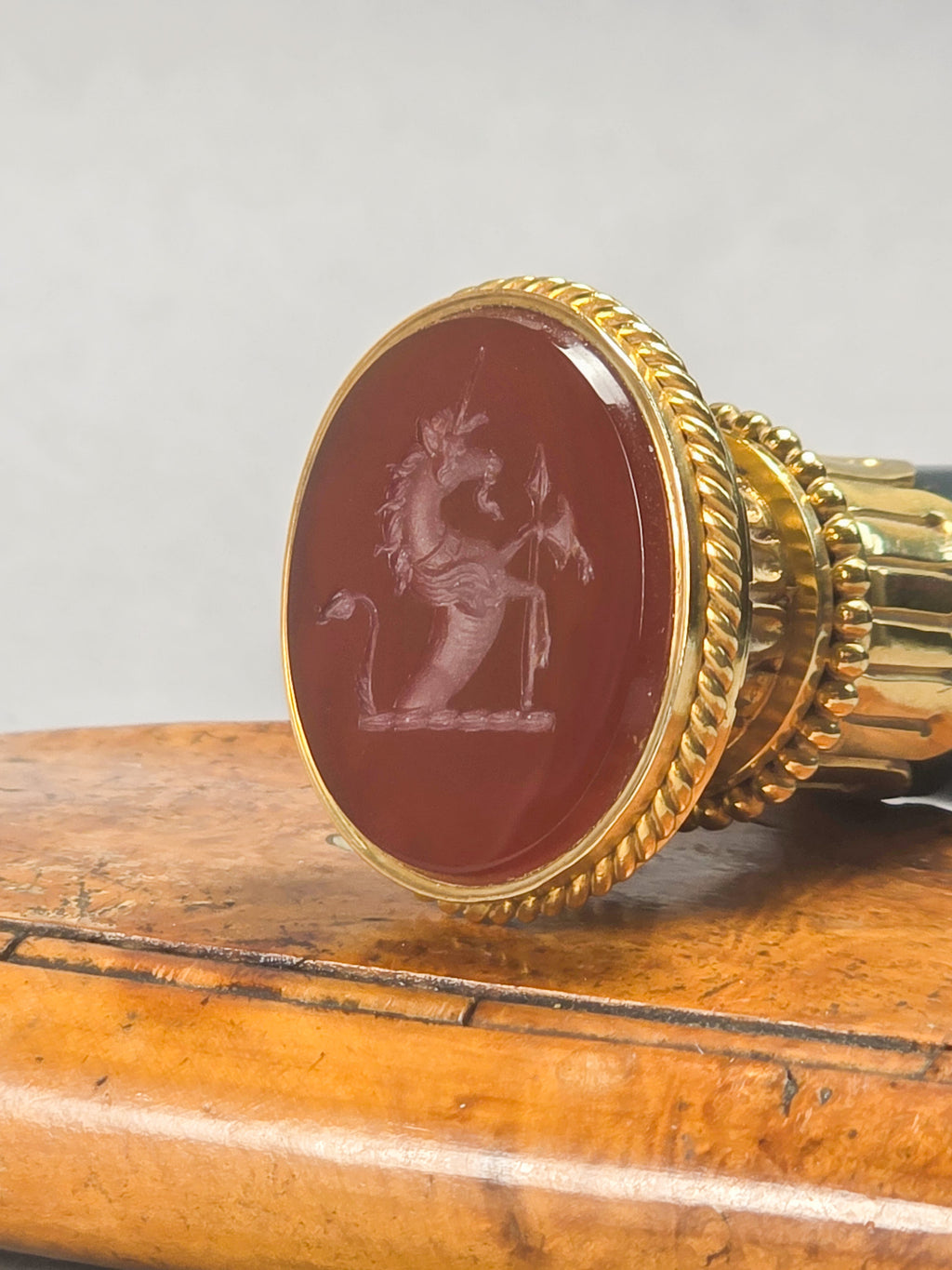 THE CALEB WRIGHT DESK SEAL A LATE 19TH CENTURY BLOODSTONE AND CARNELIAN DESK SEAL