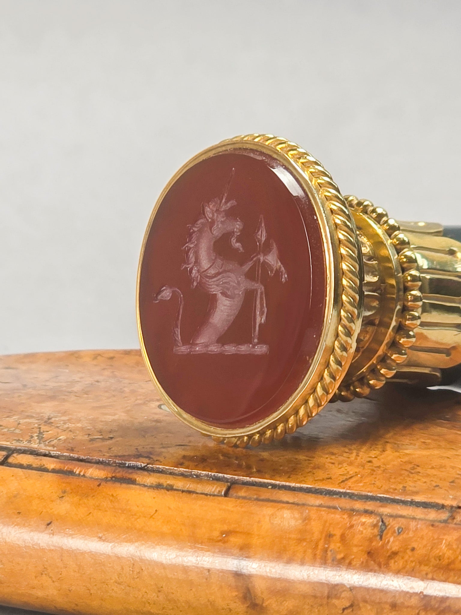 THE CALEB WRIGHT DESK SEAL A LATE 19TH CENTURY BLOODSTONE AND CARNELIAN DESK SEAL