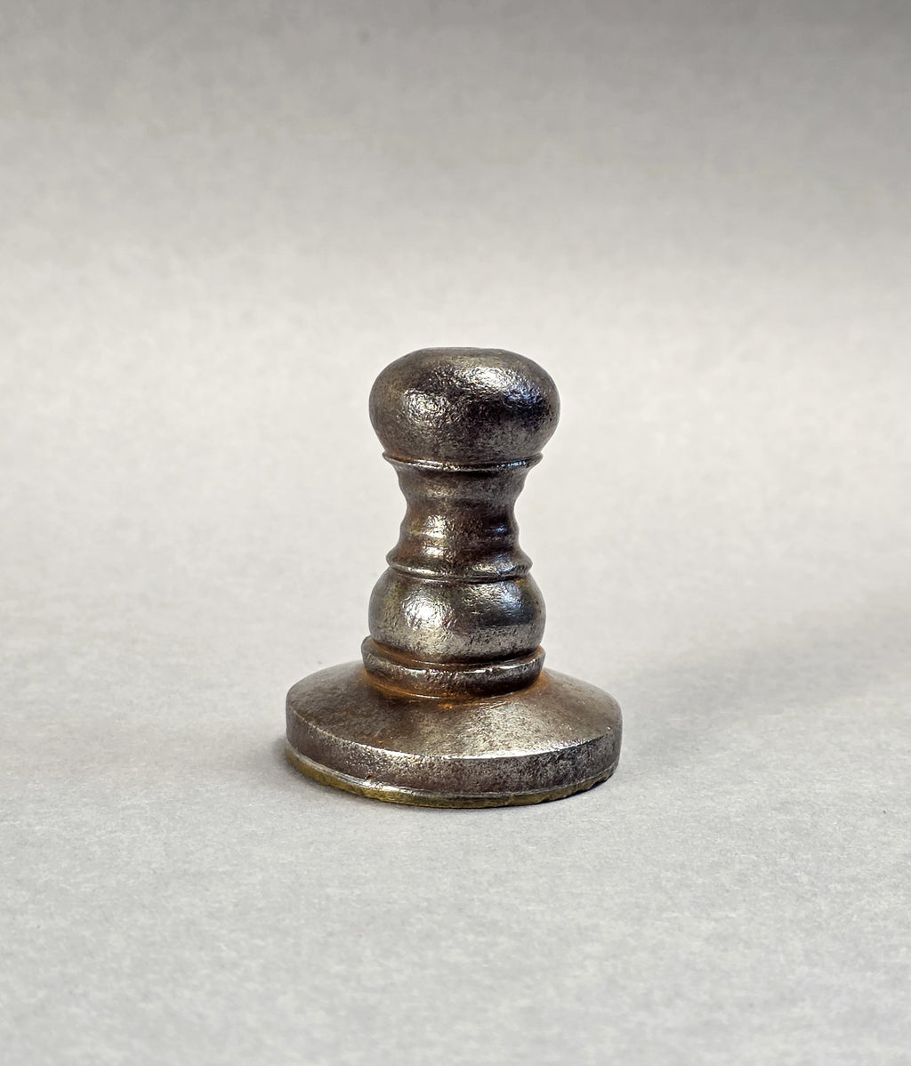 AN ESTONIAN TAILOR'S GUILD SEAL A 17TH CENTURY STEEL AND BRASS DESK SEAL