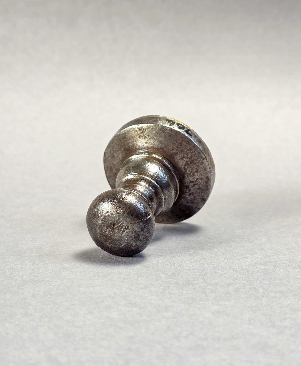 AN ESTONIAN TAILOR'S GUILD SEAL A 17TH CENTURY STEEL AND BRASS DESK SEAL