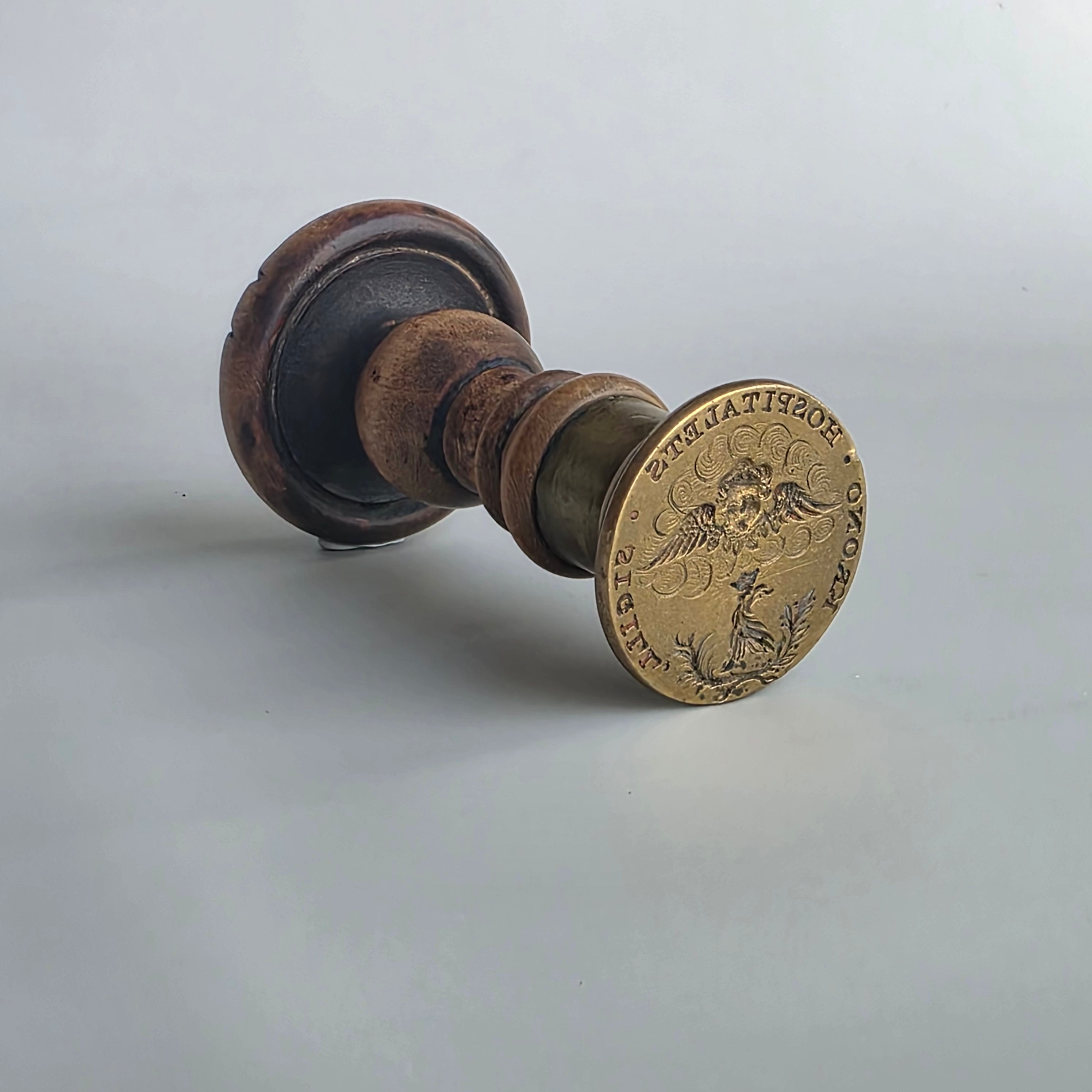 A WOOD AND BRASS SWEDISH HOSPITAL DESK SEAL