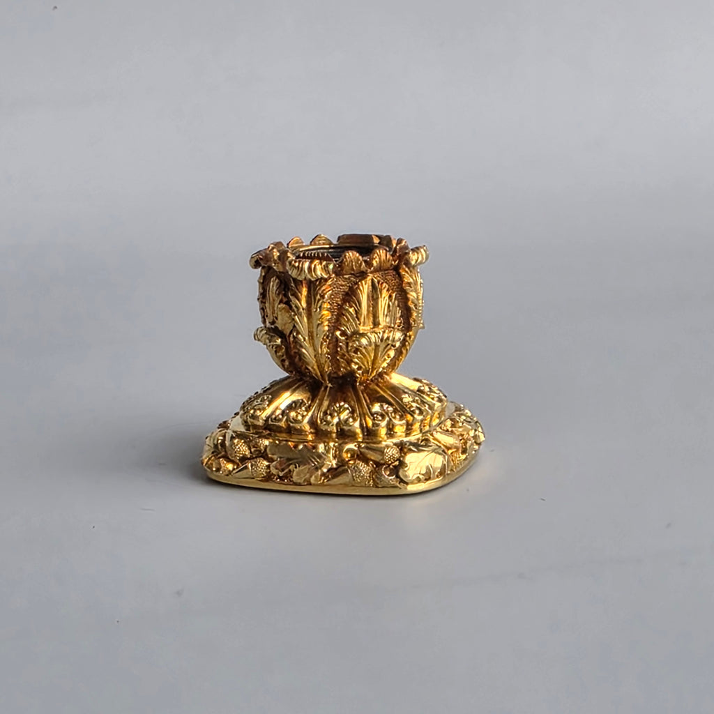 AN ENGLISH GOLD & CARNELIAN ARMORIAL DESK SEAL