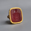 AN ENGLISH GOLD & CARNELIAN ARMORIAL DESK SEAL