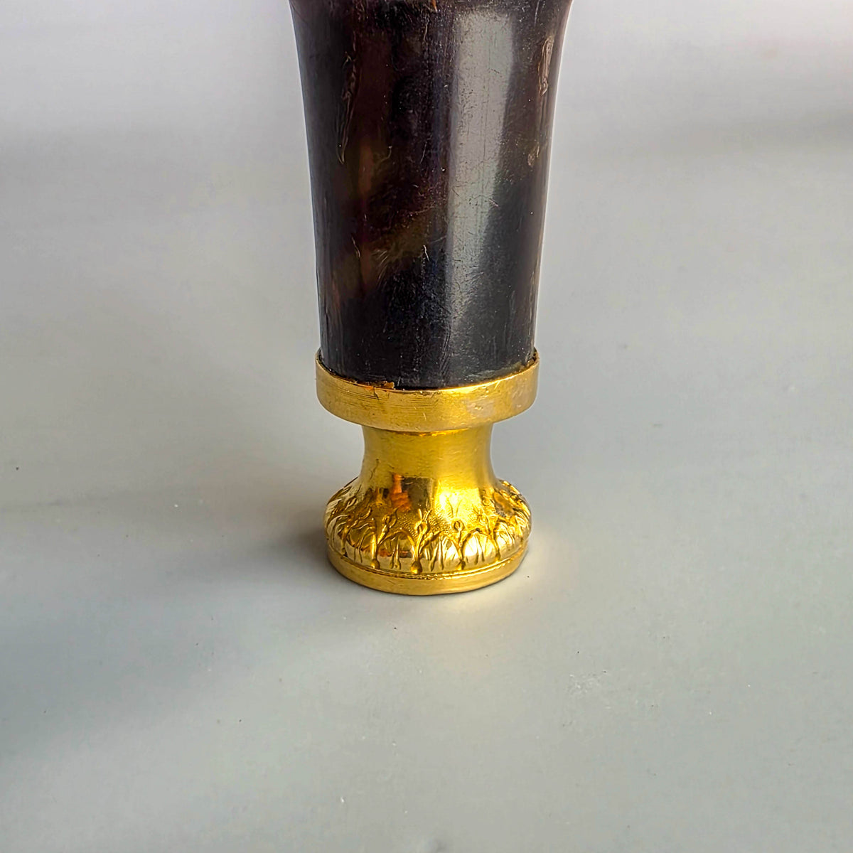UNUSUAL TORTOISESHELL GOLD & GEM-SET INFANT DESK SEAL