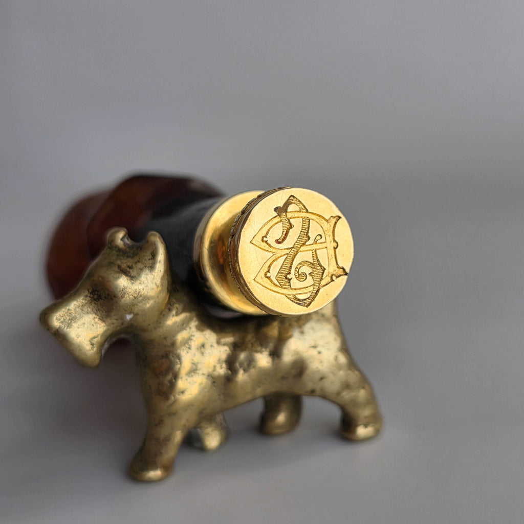 UNUSUAL TORTOISESHELL GOLD & GEM-SET INFANT DESK SEAL
