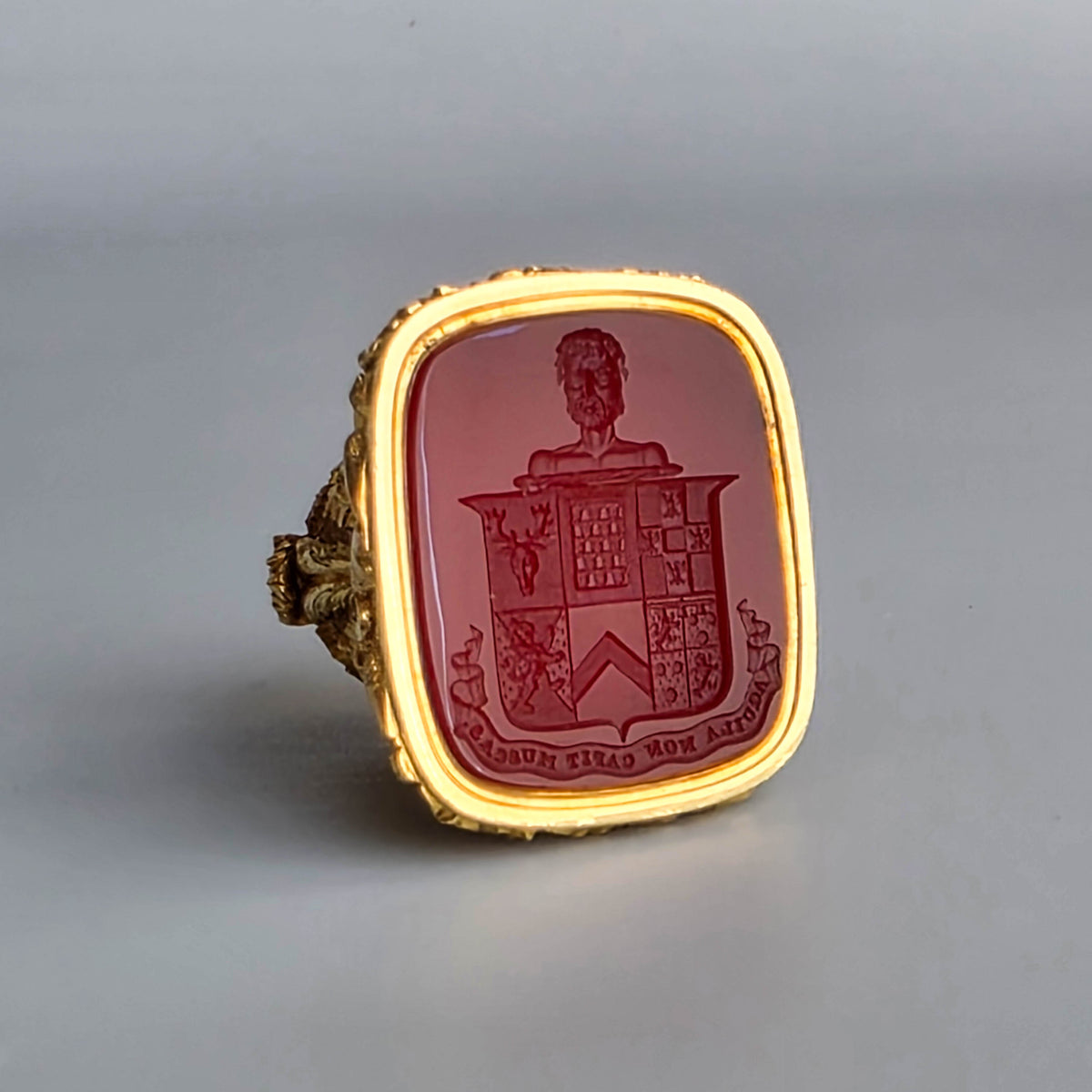 AN ENGLISH GOLD & CARNELIAN ARMORIAL DESK SEAL