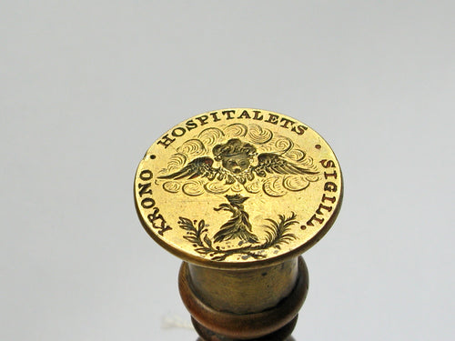 A WOOD AND BRASS SWEDISH HOSPITAL DESK SEAL
