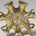A SEVEN -SIDED SILVER-GILT SEAL