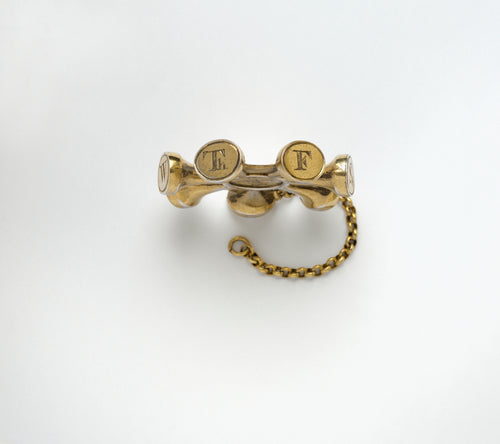 A SEVEN -SIDED SILVER-GILT SEAL