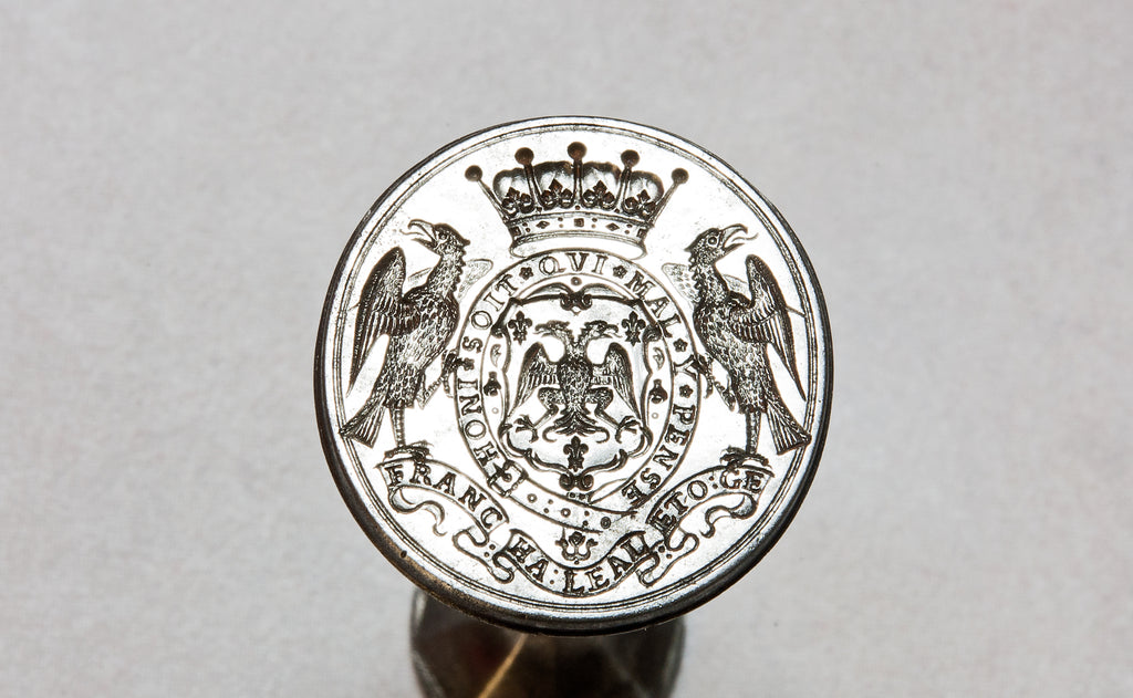 AN ENGLISH DOUBLE-ENDED STEEL DESK SEAL