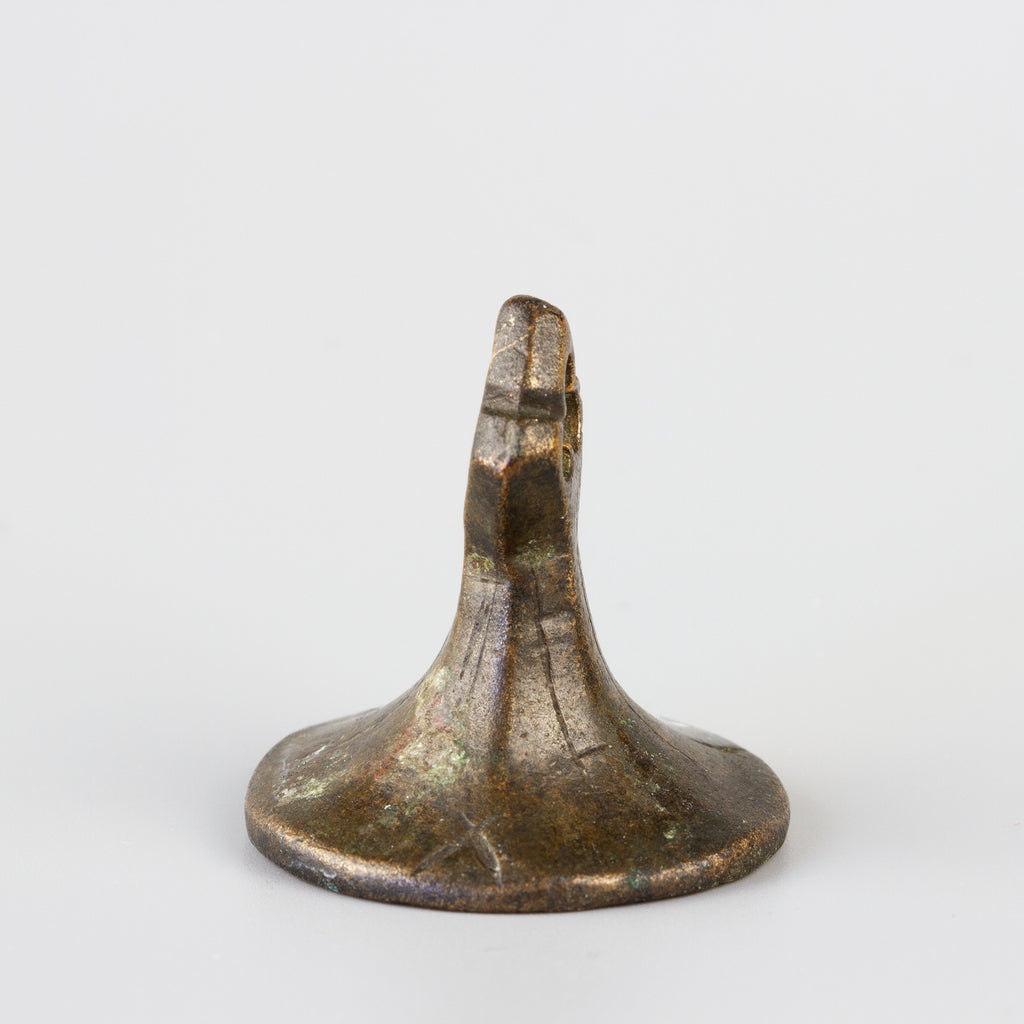 Side view of medieval bronze wax seal