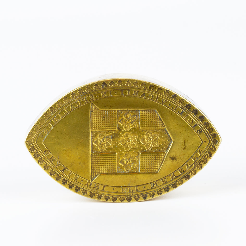 Closeup of matrix showing vicar general armorial and inscription