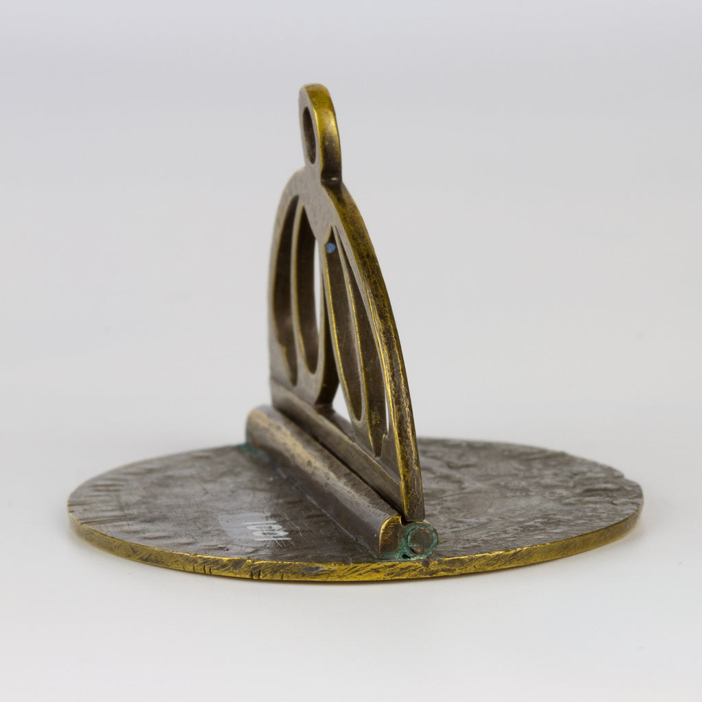 Side view of handle and matrix of brass wax seal