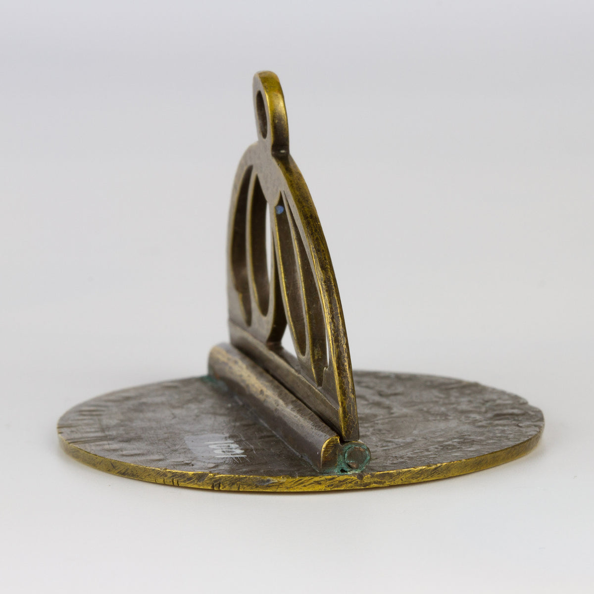 Side view of handle and matrix of brass wax seal