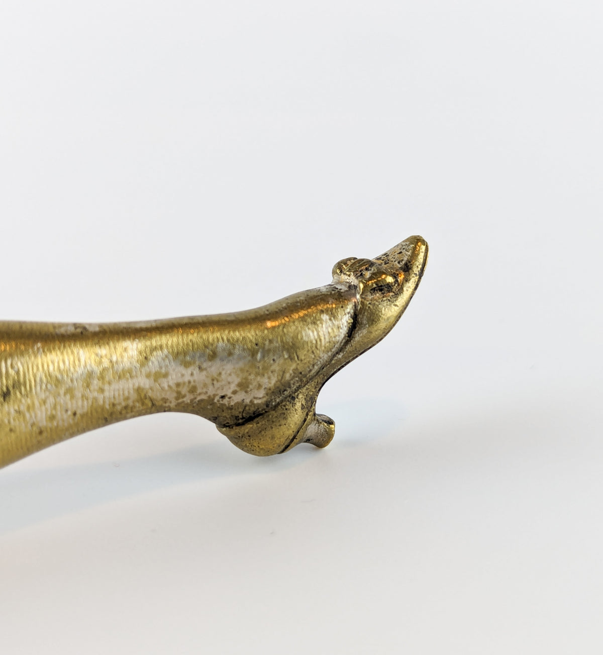 Detial of foot of gilt brass lady's leg wax seal