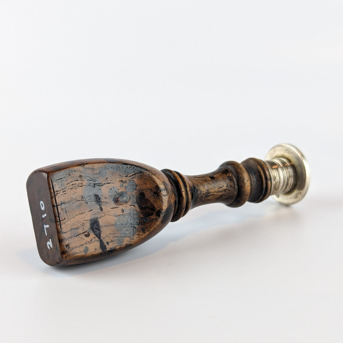 Handle of antique wood and silver wax seal
