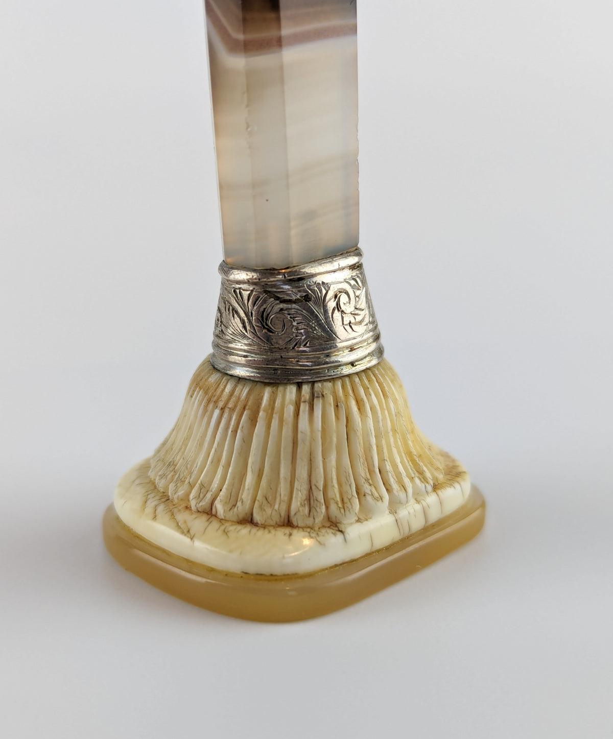 Silver and bone cushion on antique wax seal