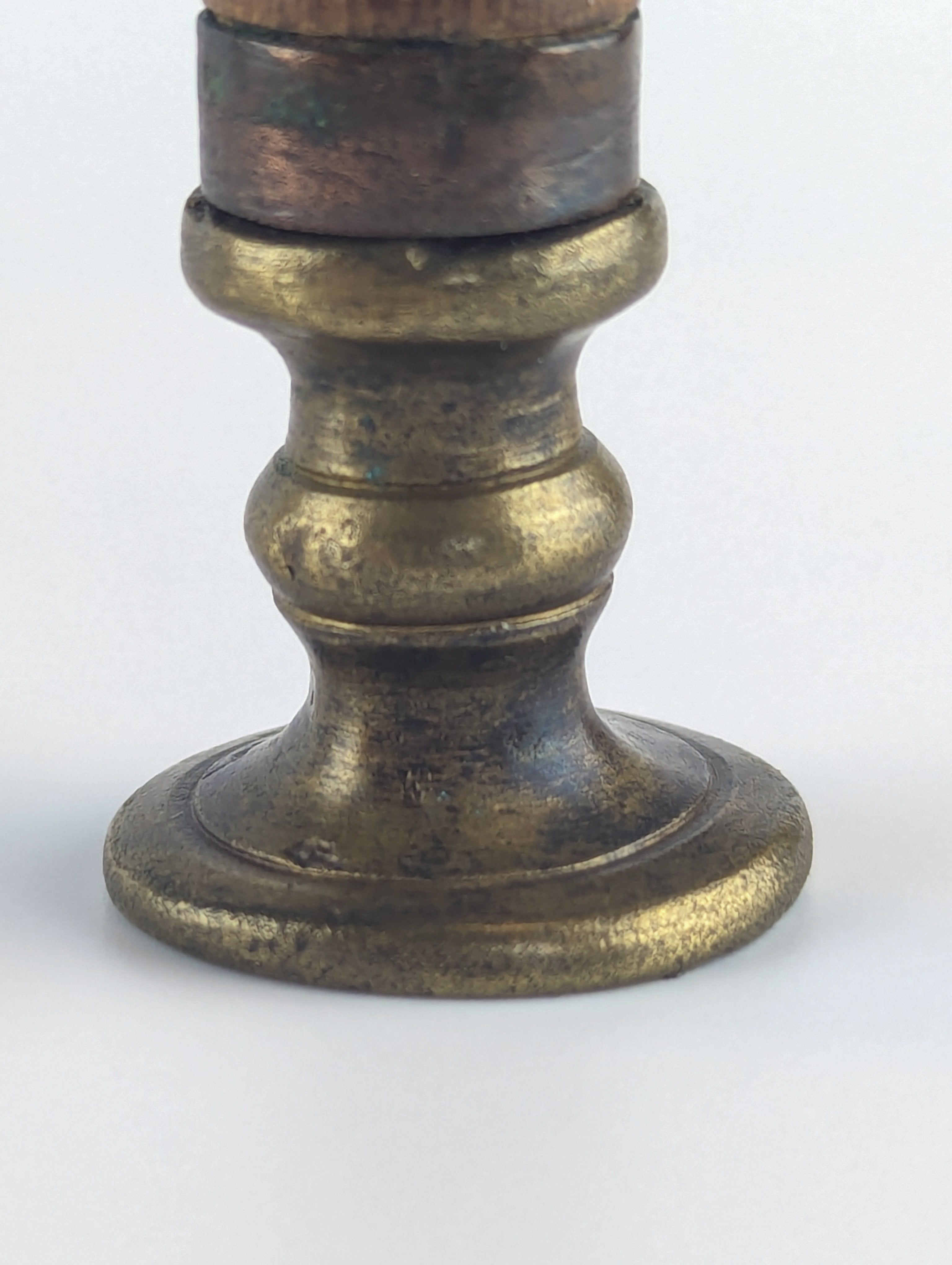 Brass matrix closeup of antique wax ink stamp