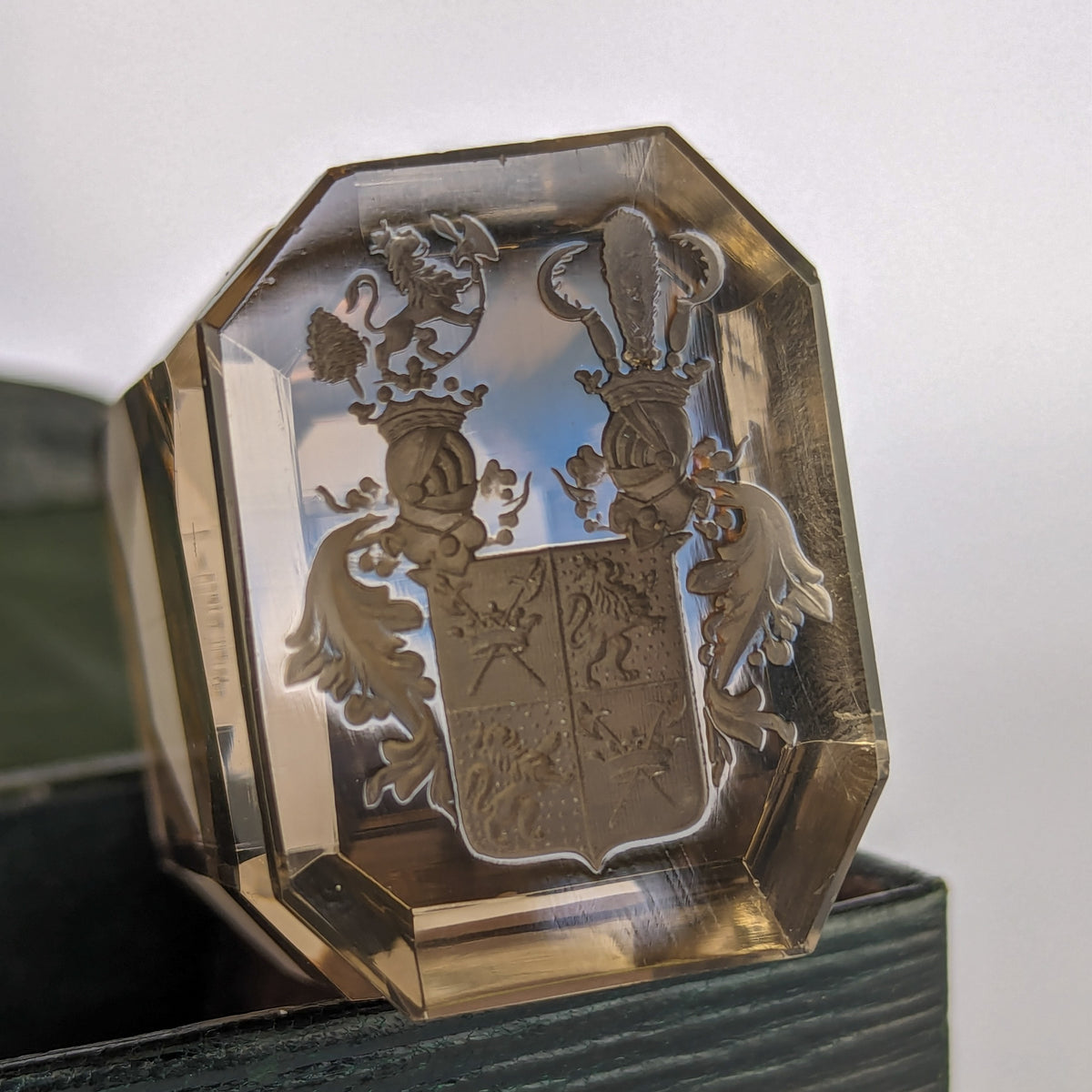 Closeup of matrix of crystal wax seal on black leather case