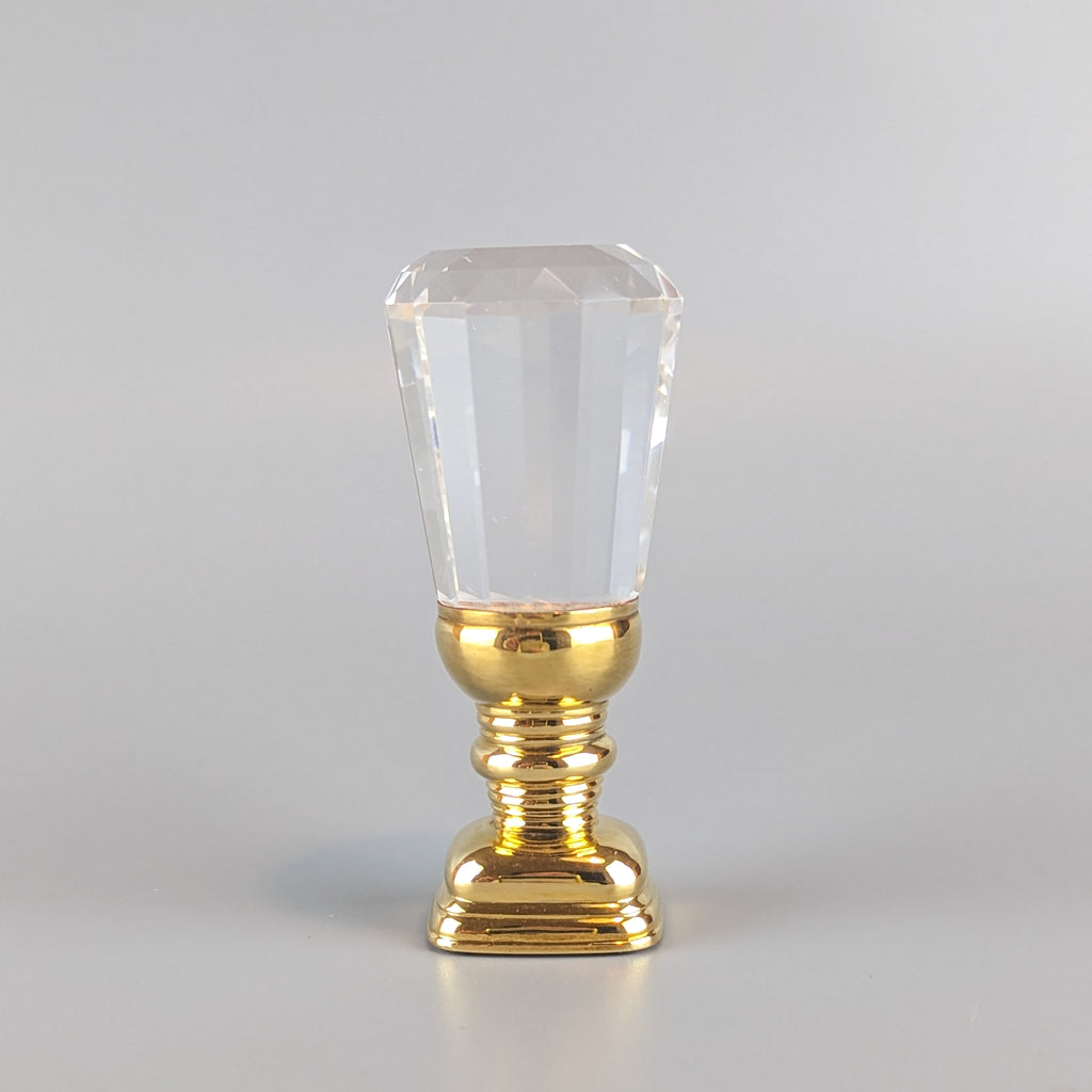 Full length shot of crystal and gold wax seal
