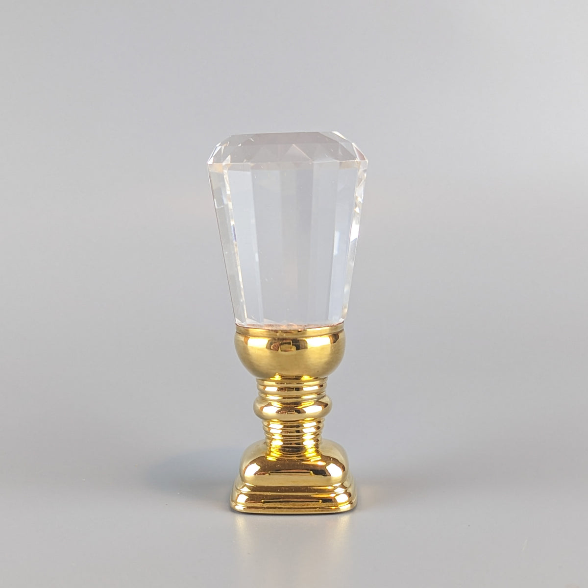 Full length shot of crystal and gold wax seal