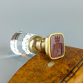 Matrix showing armorial on gold & crystal wax seal