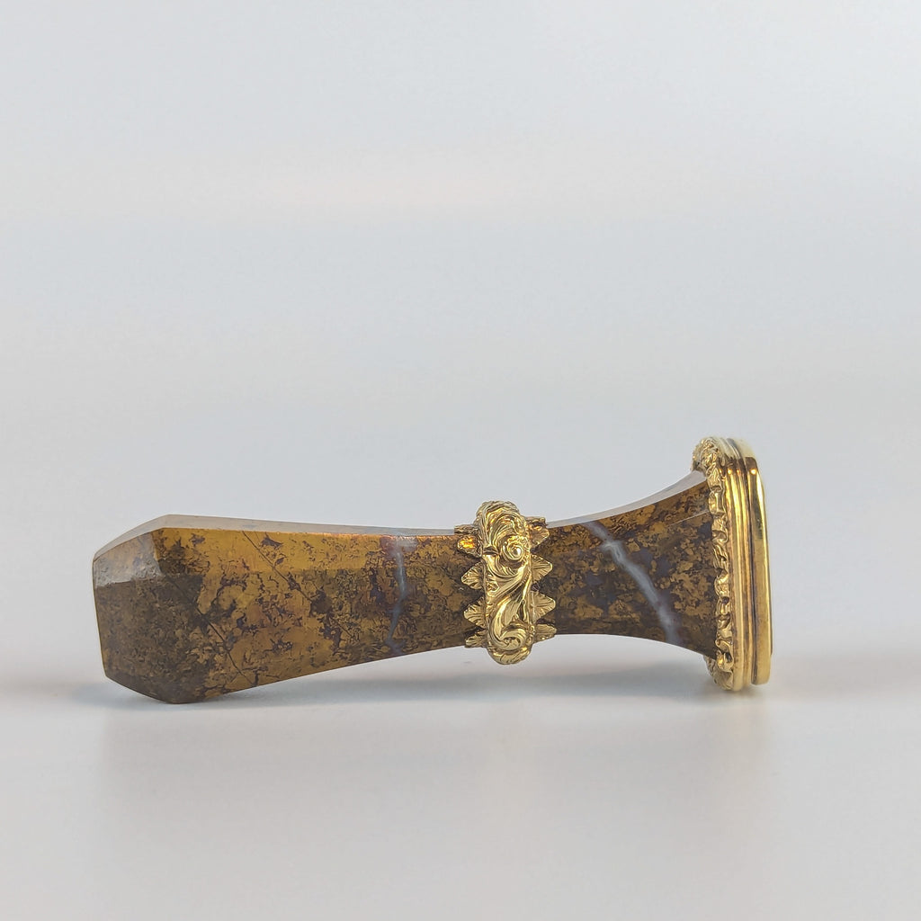 Side view of jasper and gold wax seal