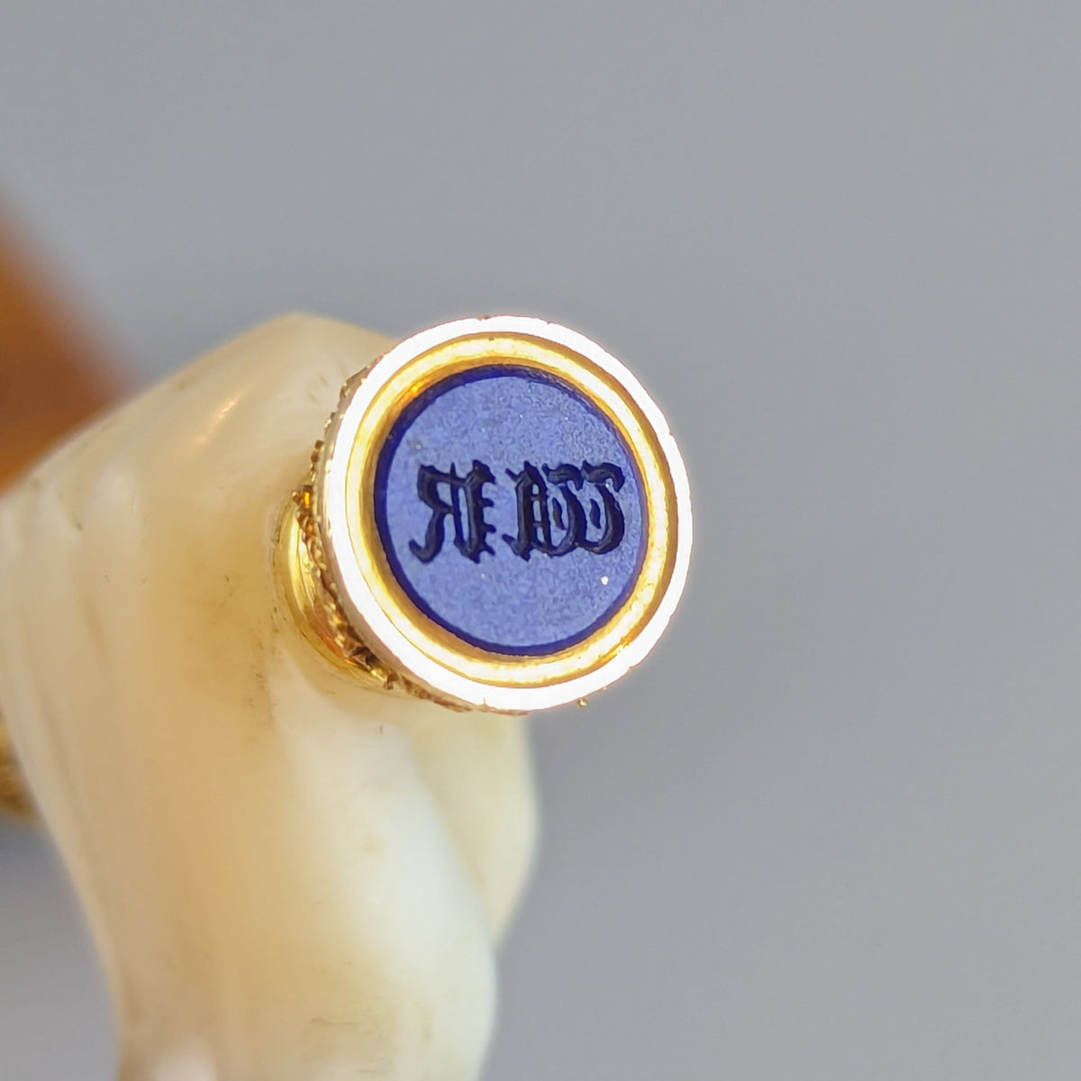 Detail of small engraved matrix of hand wax seal