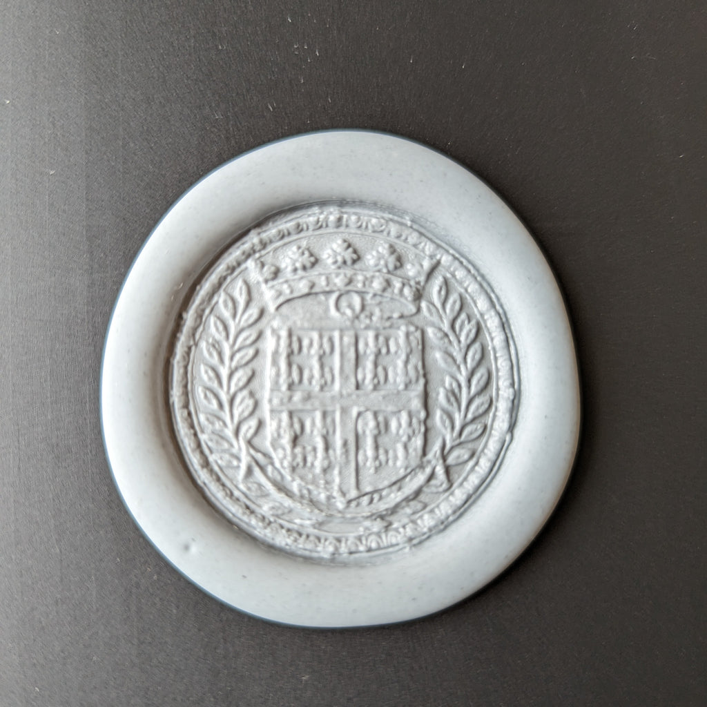 Wax impression of 18th century brass seal