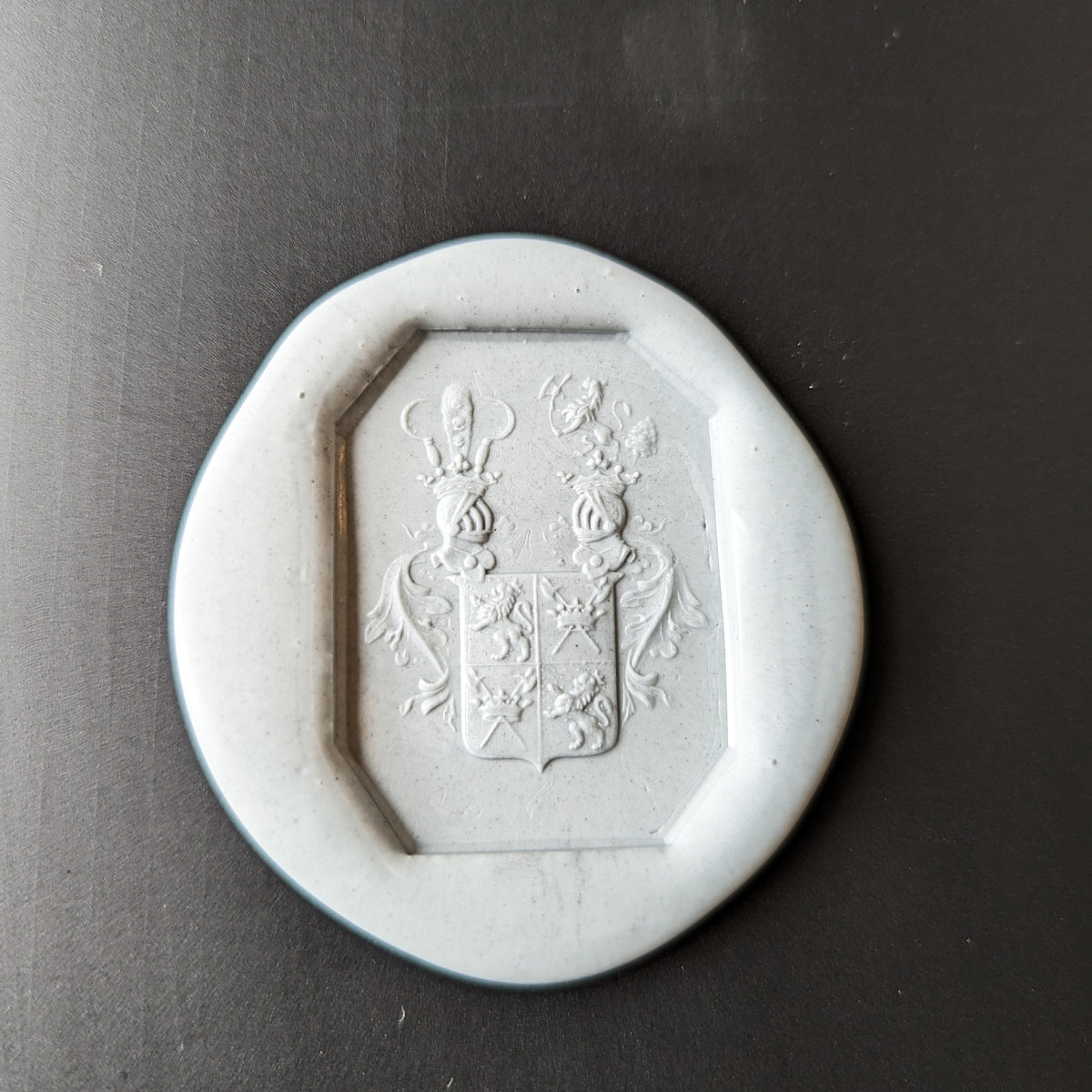 Wax impression of antique seal showing armorial