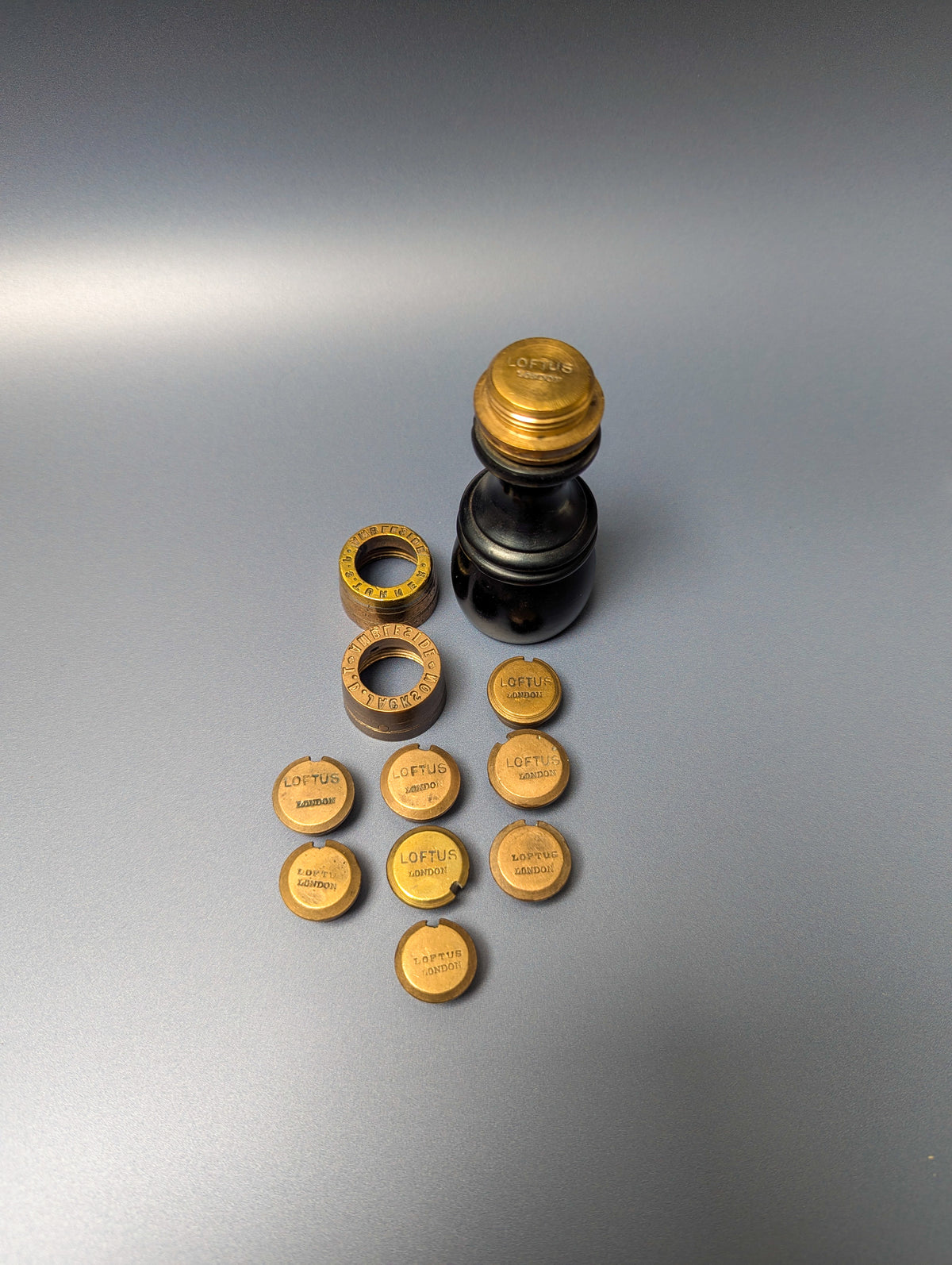 Early Ebony Brass Vitners / Ambleside Interchangeable Desk Seal - 7x Alcohol Matrices