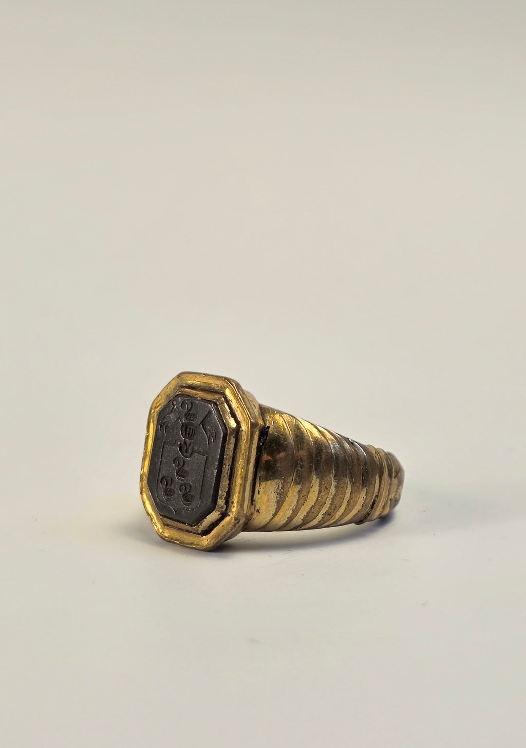 c18THC CONTINENTAL GILT AND STEEL ARMORIAL RING