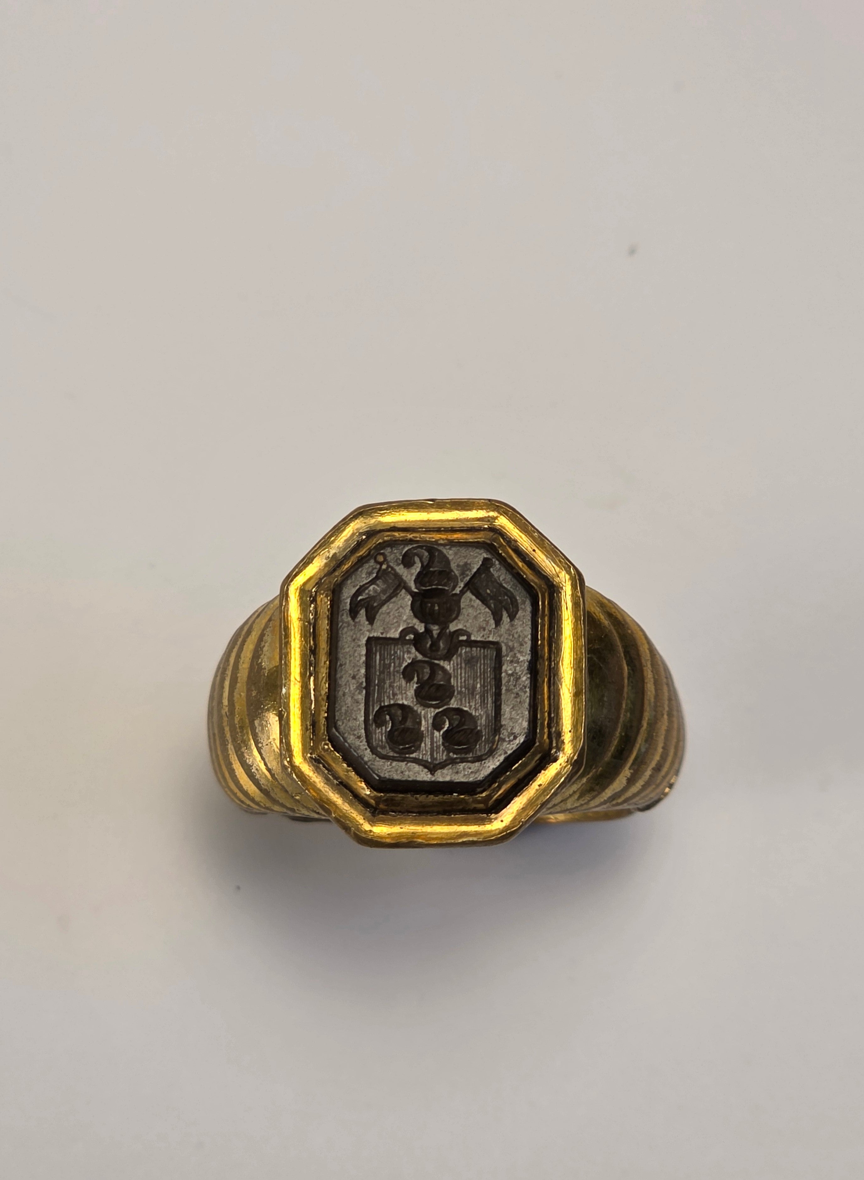 c18THC CONTINENTAL GILT AND STEEL ARMORIAL RING
