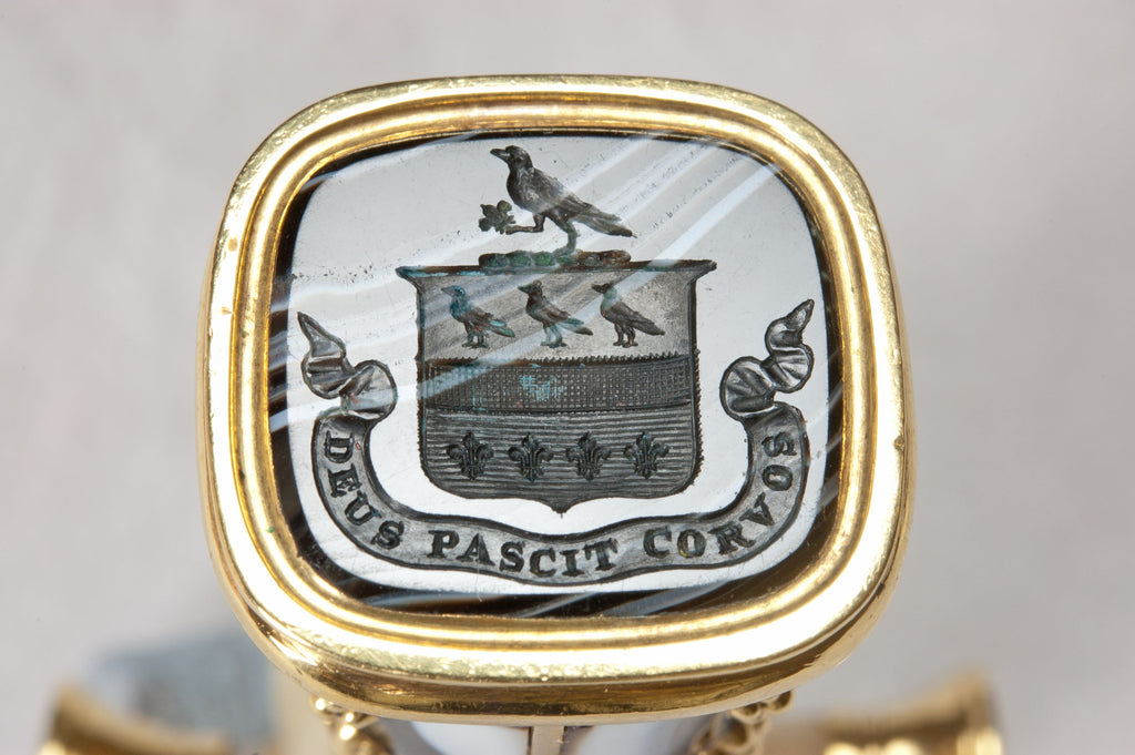 Matrix detail showing family arms and motto