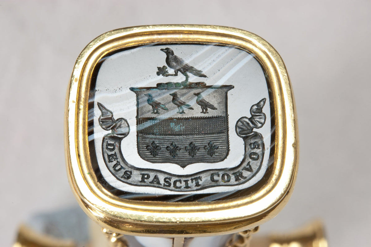 Matrix detail showing family arms and motto