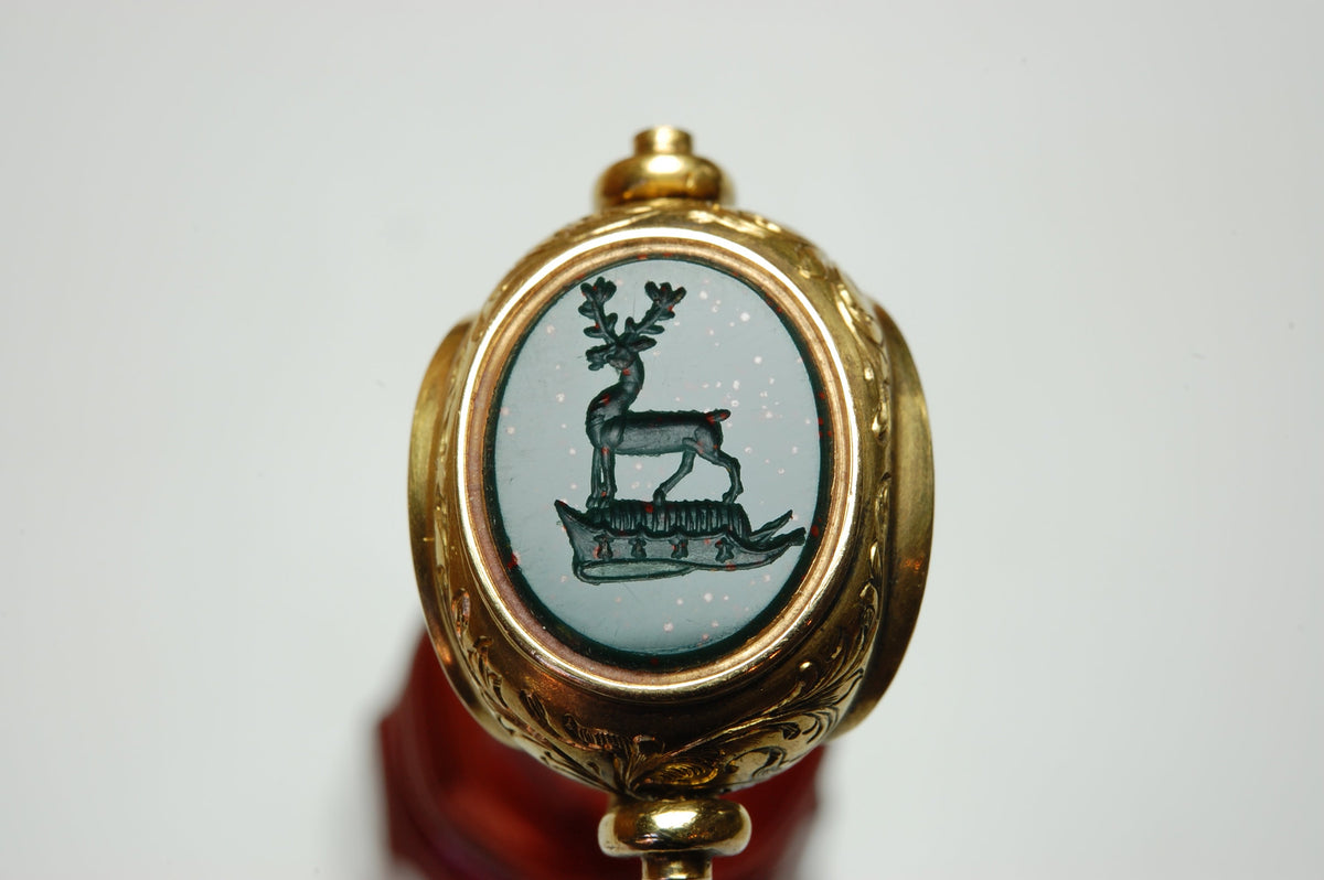 Bloodstone matrix on wax seal depicting stag on a cap of maintenance