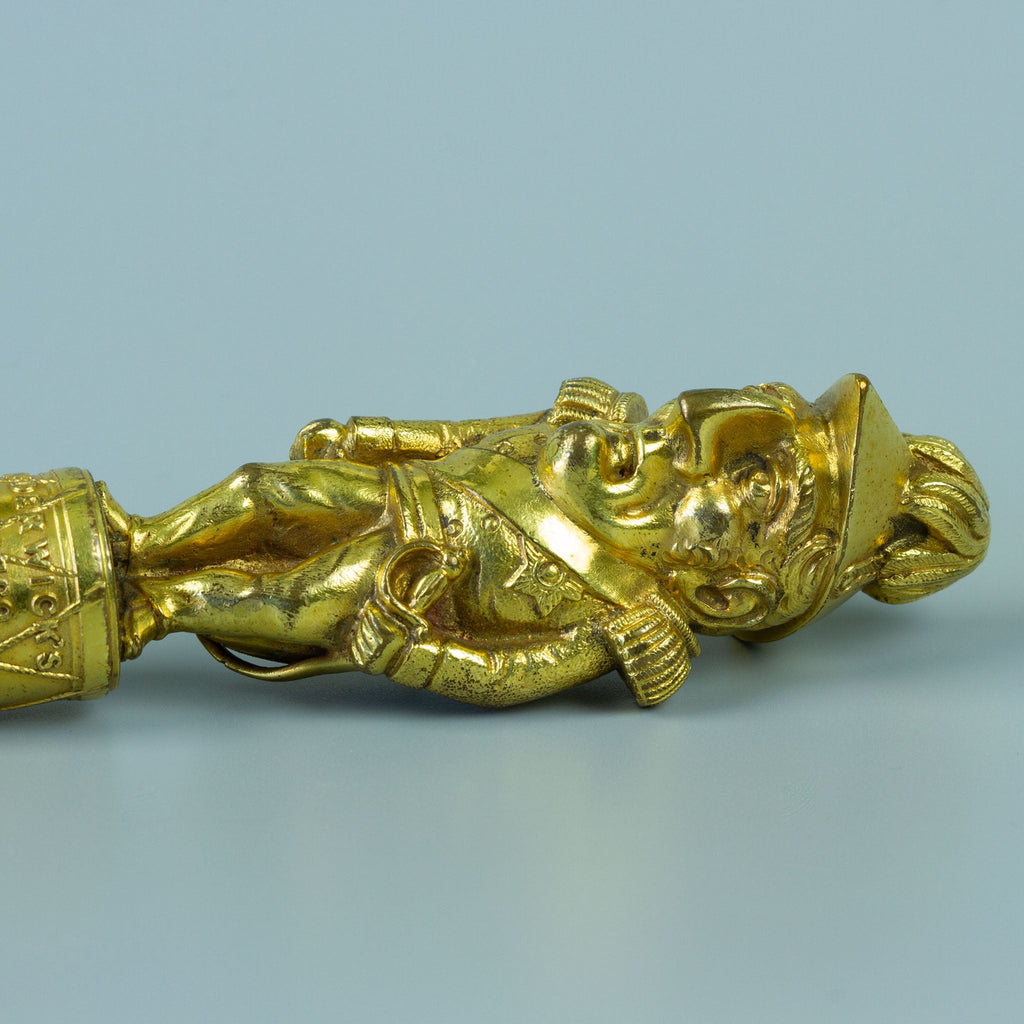 Close up of gilt wax seal figurine of Wellington in military uniform