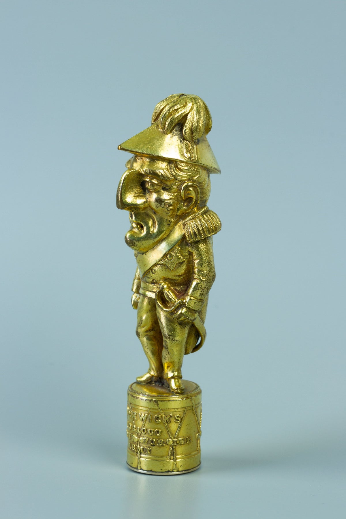 Gilt figure of Wellington in uniform on wax seal