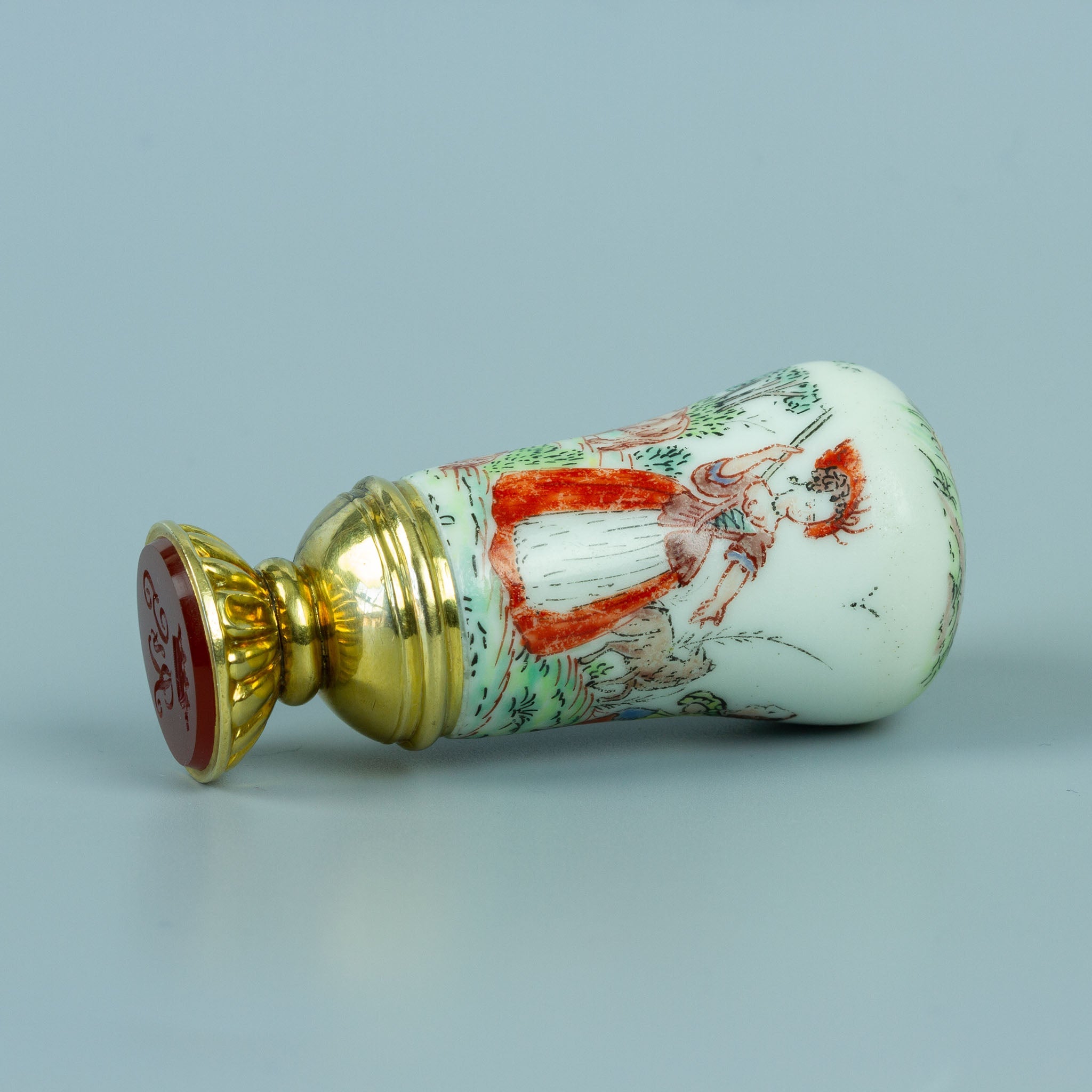 English porcelain and gold wax seal with pastoral scene engraved on handle