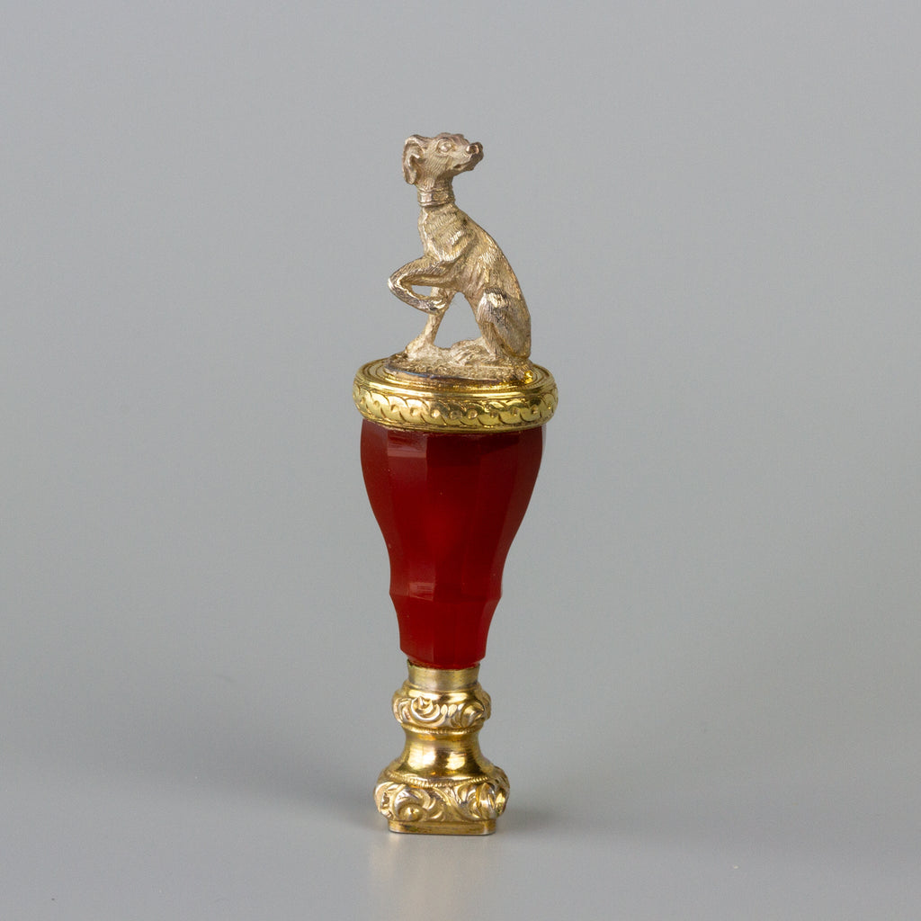 Figurine wax seal in the form of a whippet on a red handle and gold mount