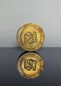 Circular brass wax seal matrix showing eagle and inscription 